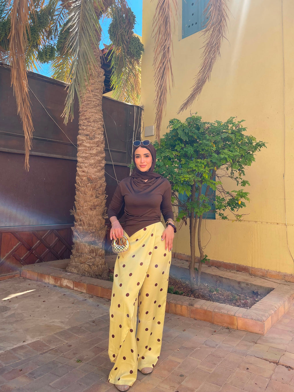 Layering polka dots yellow pants