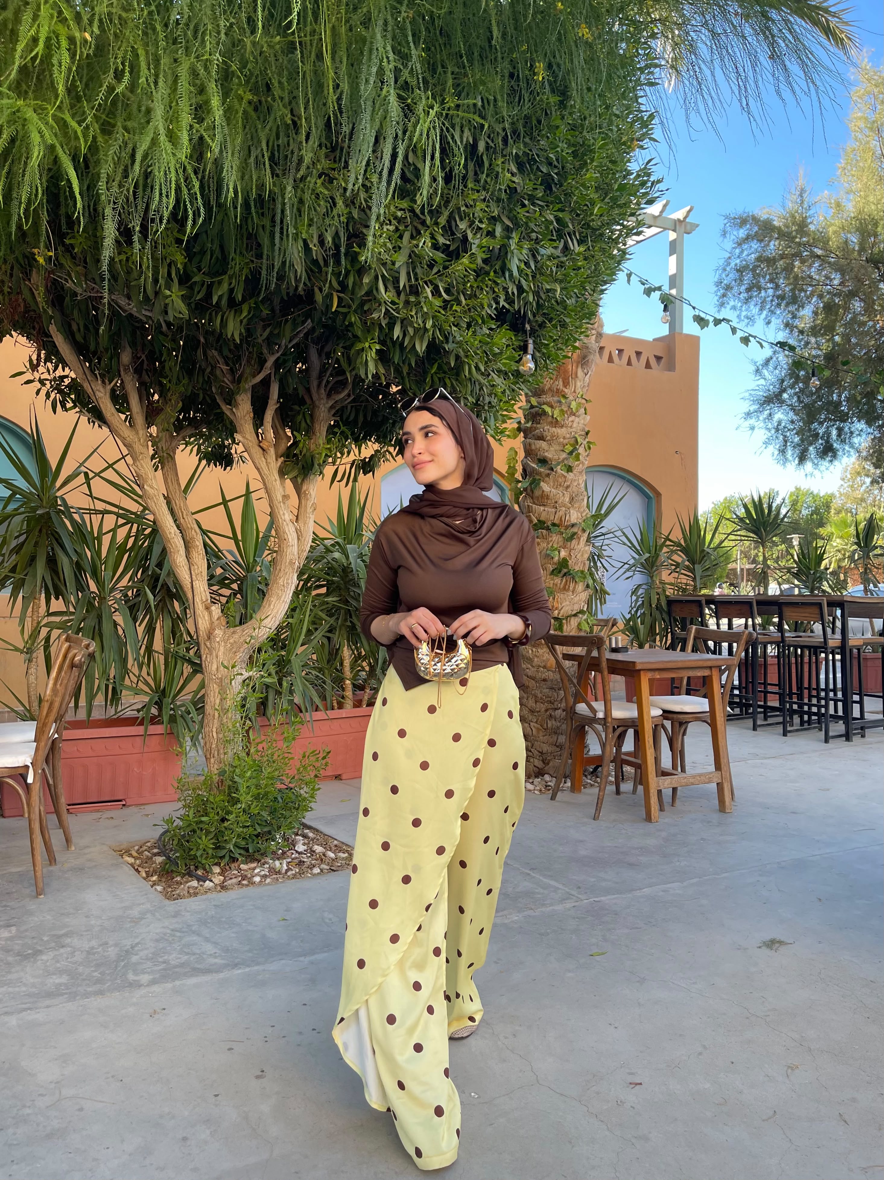 Layering polka dots yellow pants