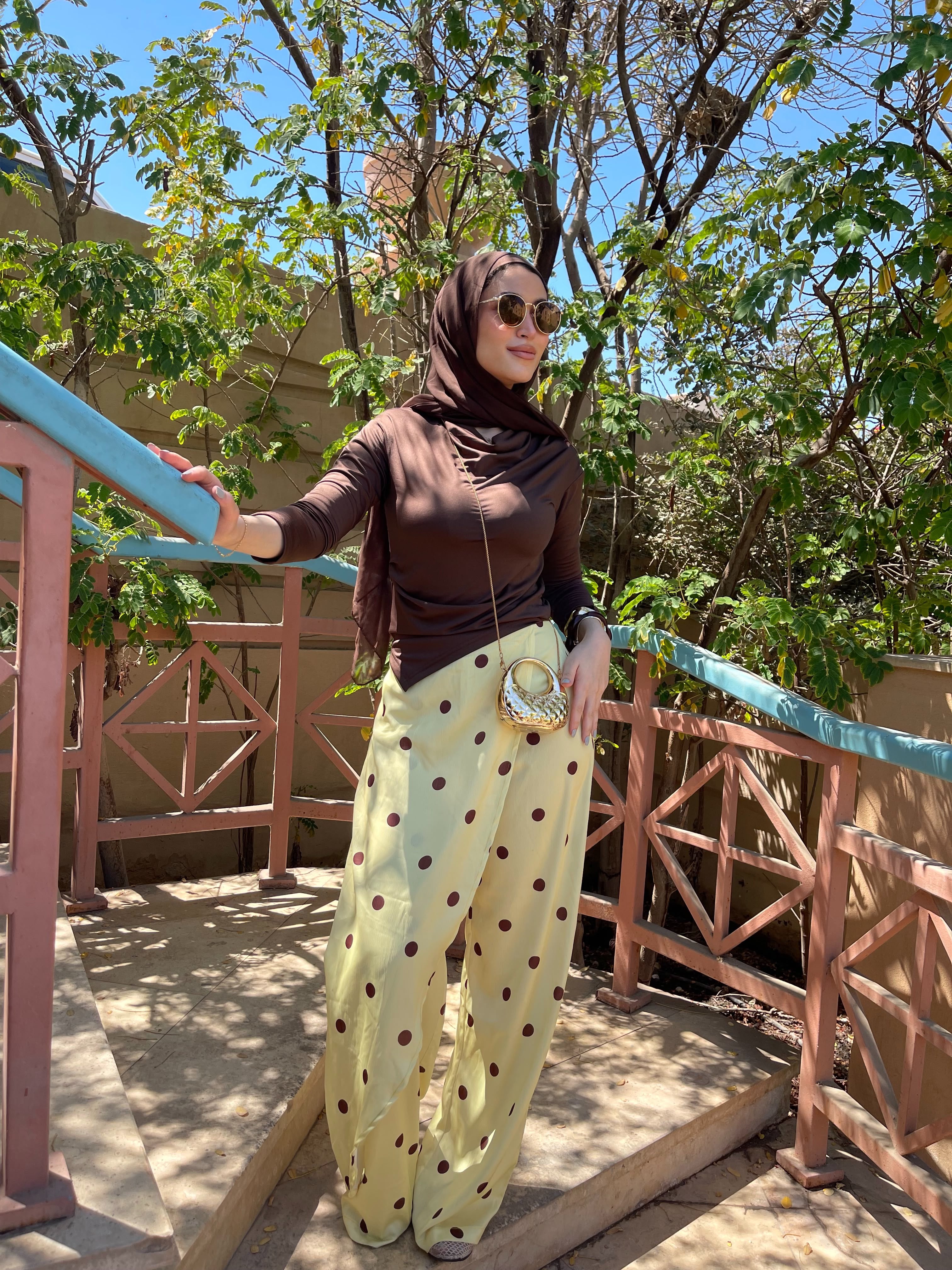 Layering polka dots yellow pants