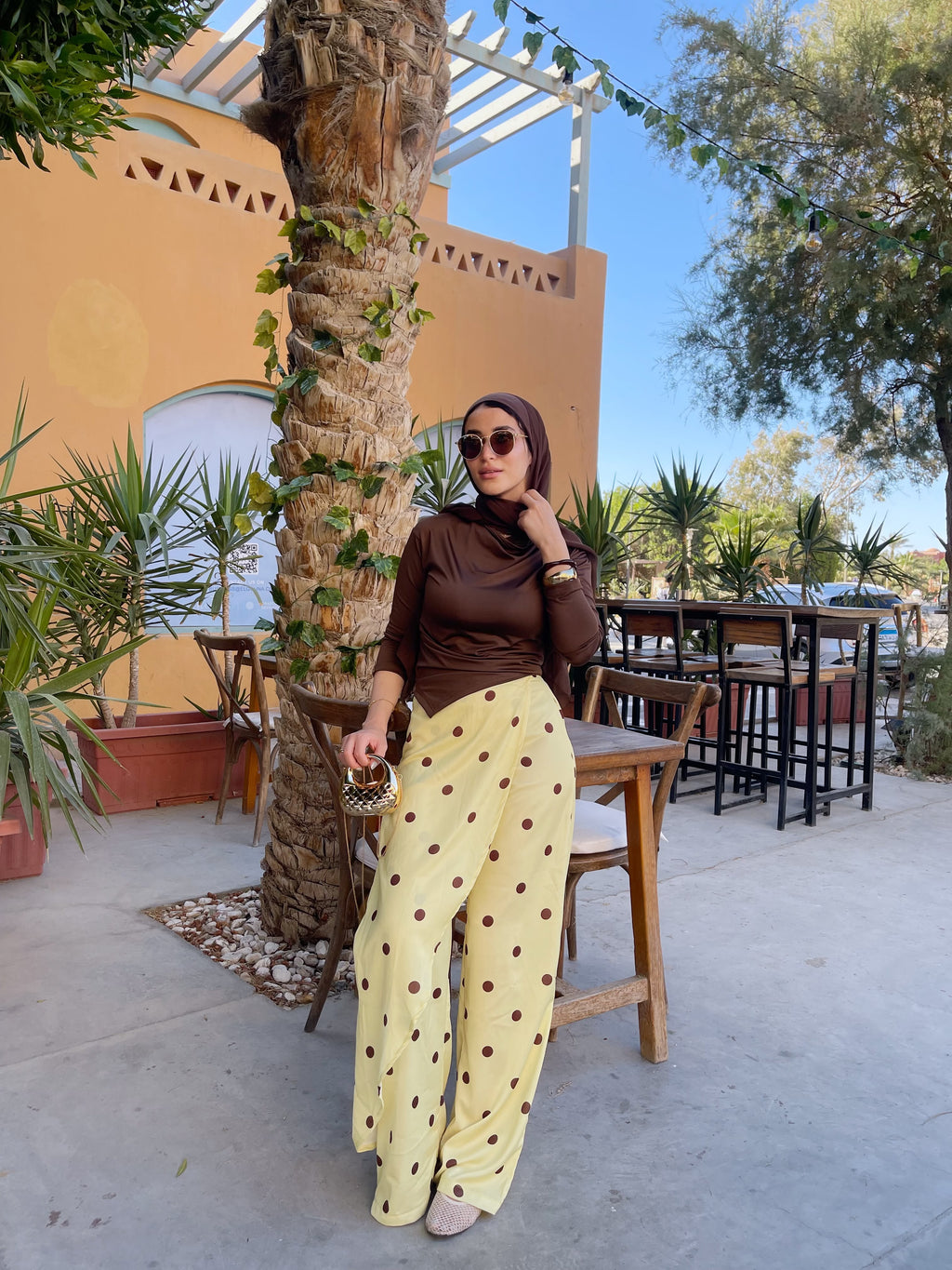 Layering polka dots yellow pants