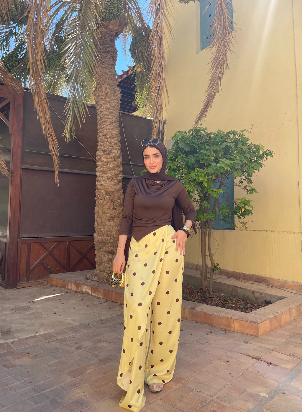 Layering polka dots yellow pants