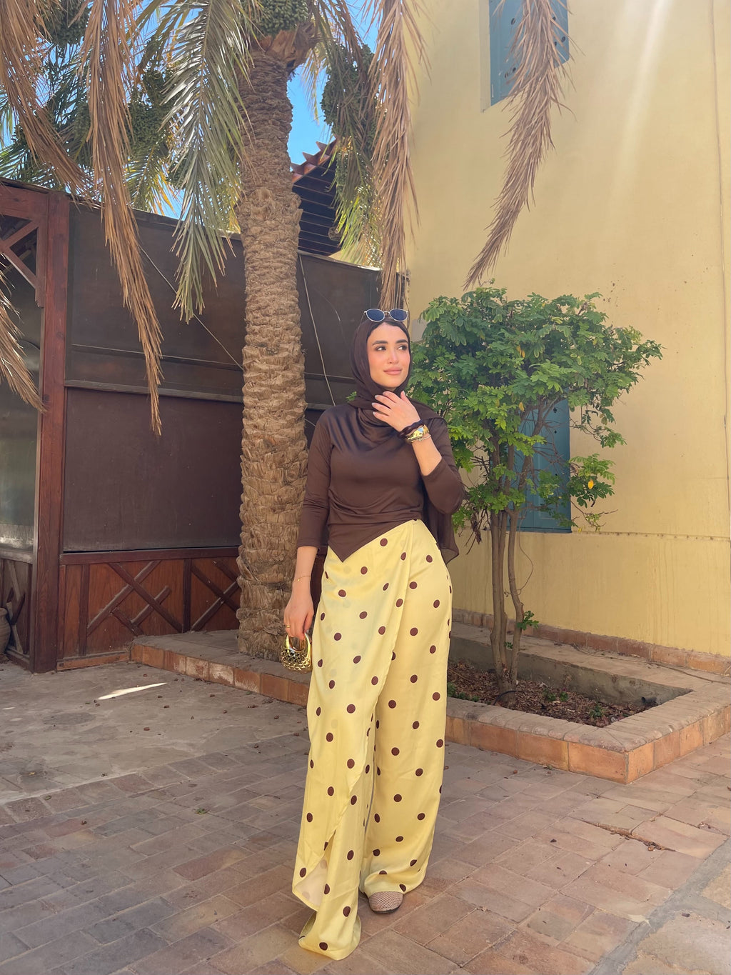 Layering polka dots yellow pants