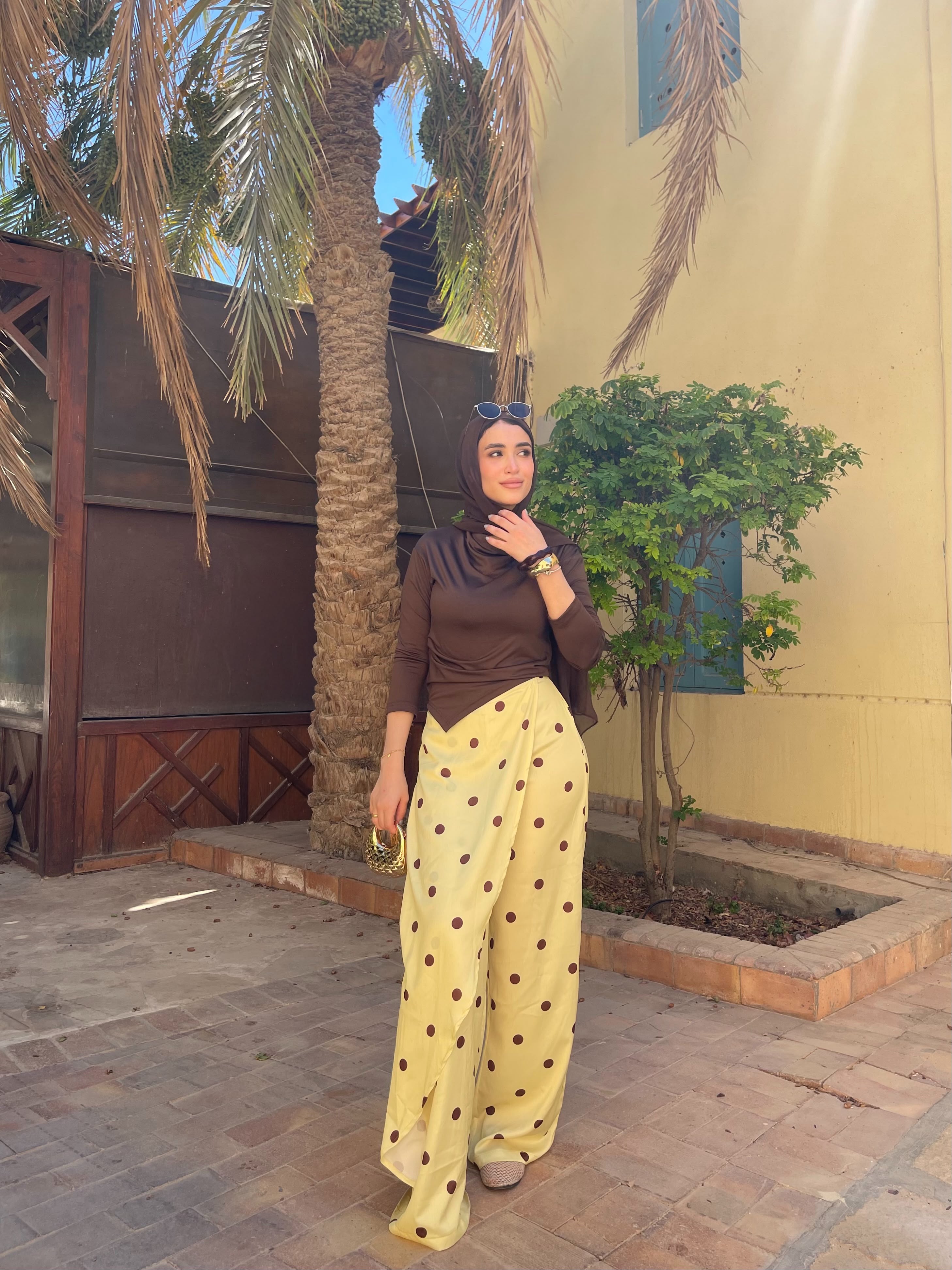 Layering polka dots yellow pants