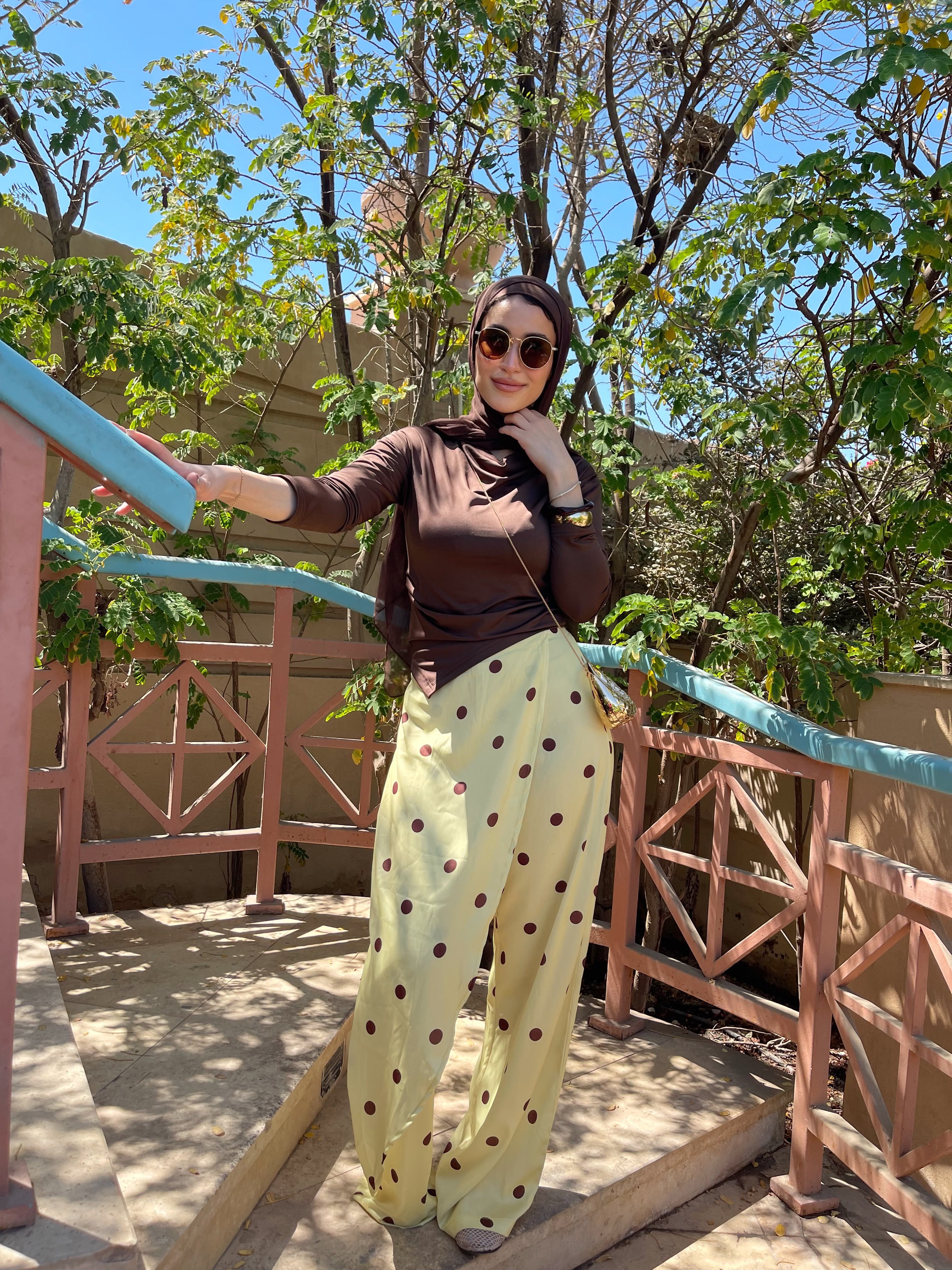 Layering polka dots yellow pants