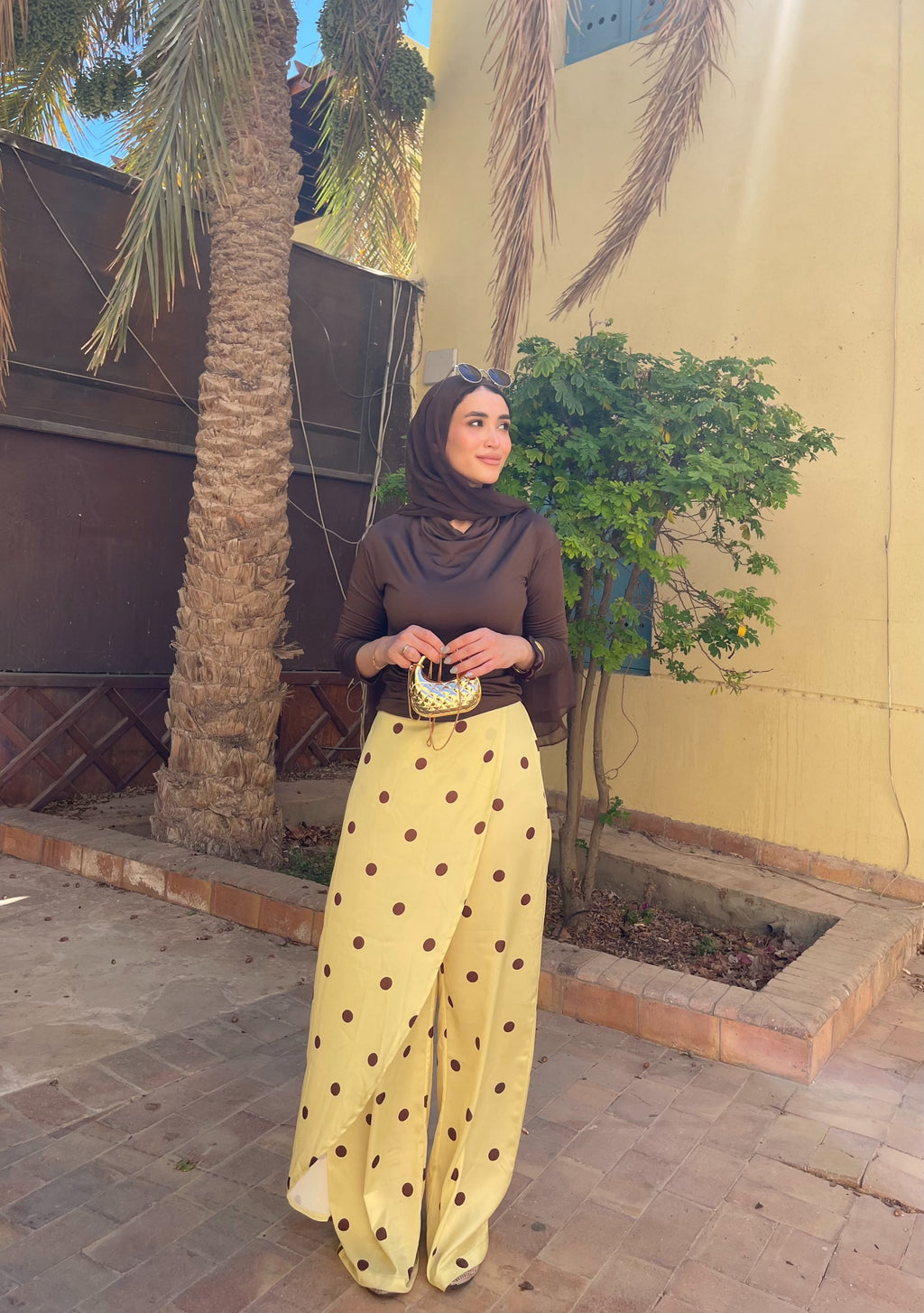 Layering polka dots yellow pants