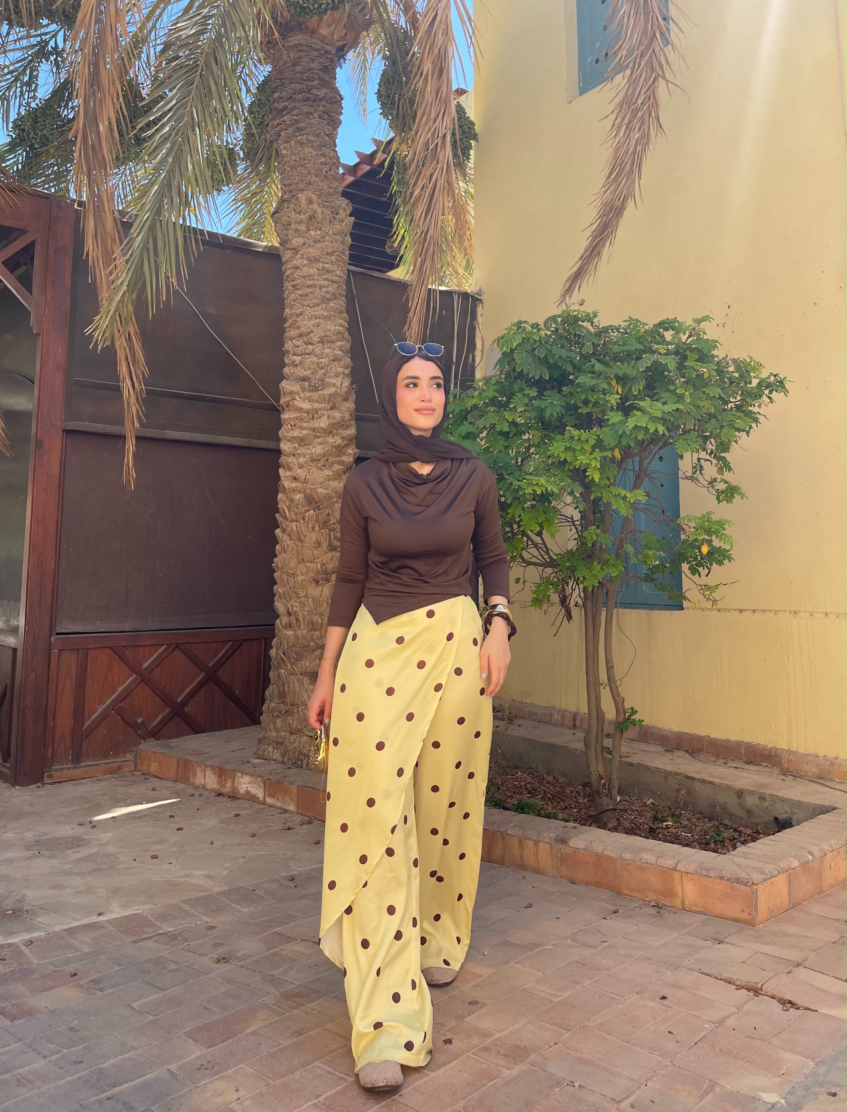 Layering polka dots yellow pants