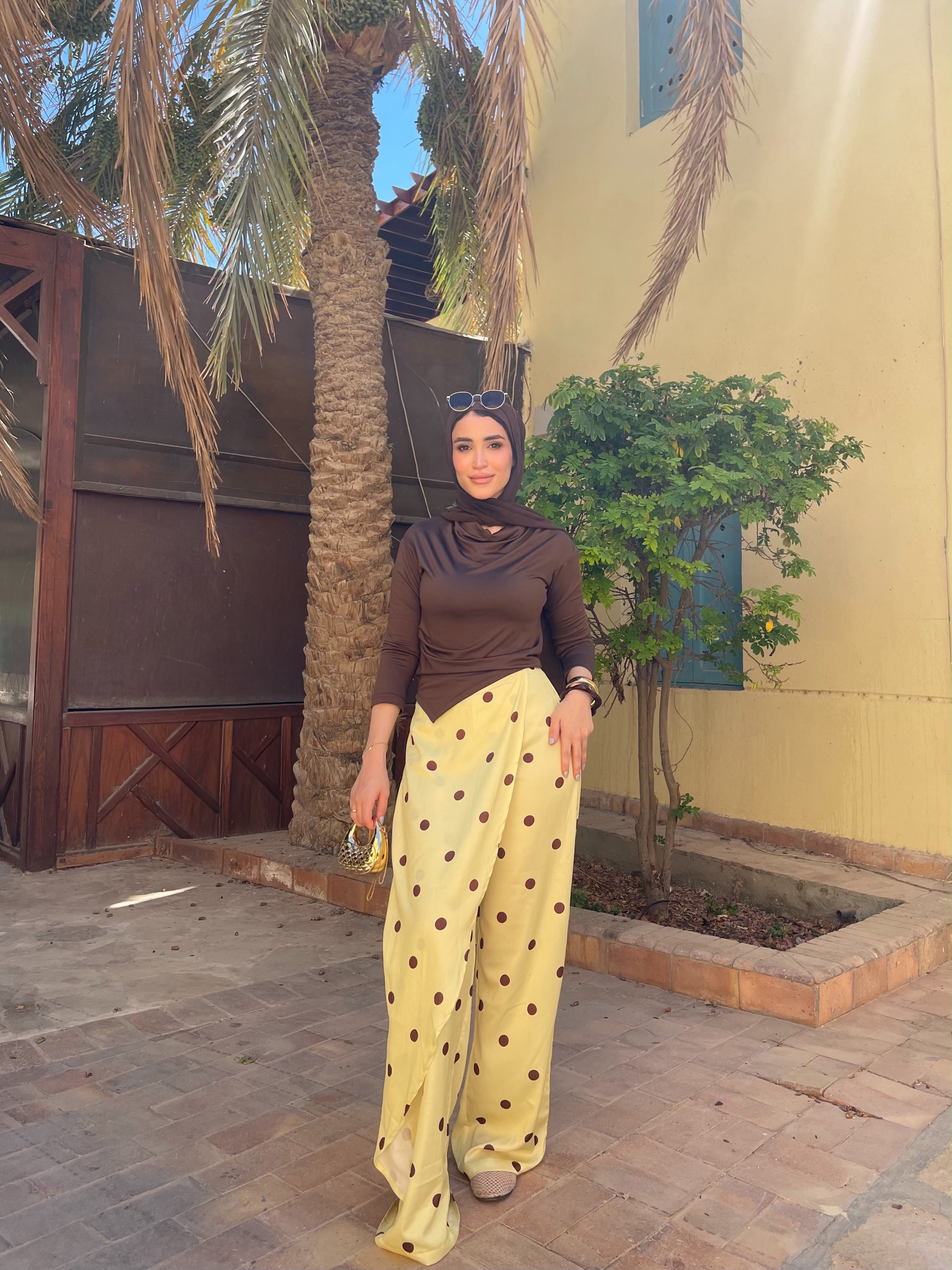 Layering polka dots yellow pants